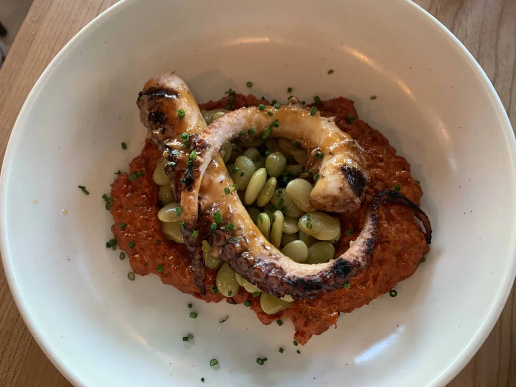 Eleven Great Restaurants On Daniel Island: Grilled Octopus Served With A Romesco Sauce And Field Peas
