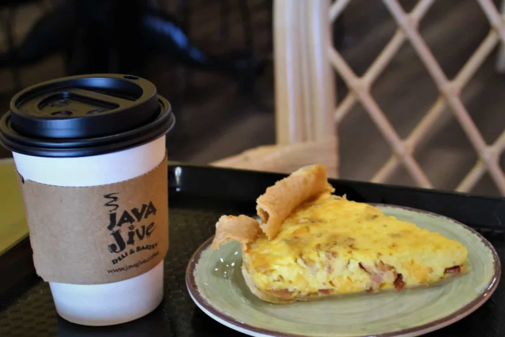 Mississippi Mud café au lait and a slice of bacon cheddar quiche