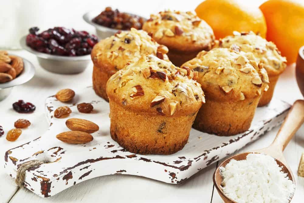 Orange muffins with dried fruits and nuts