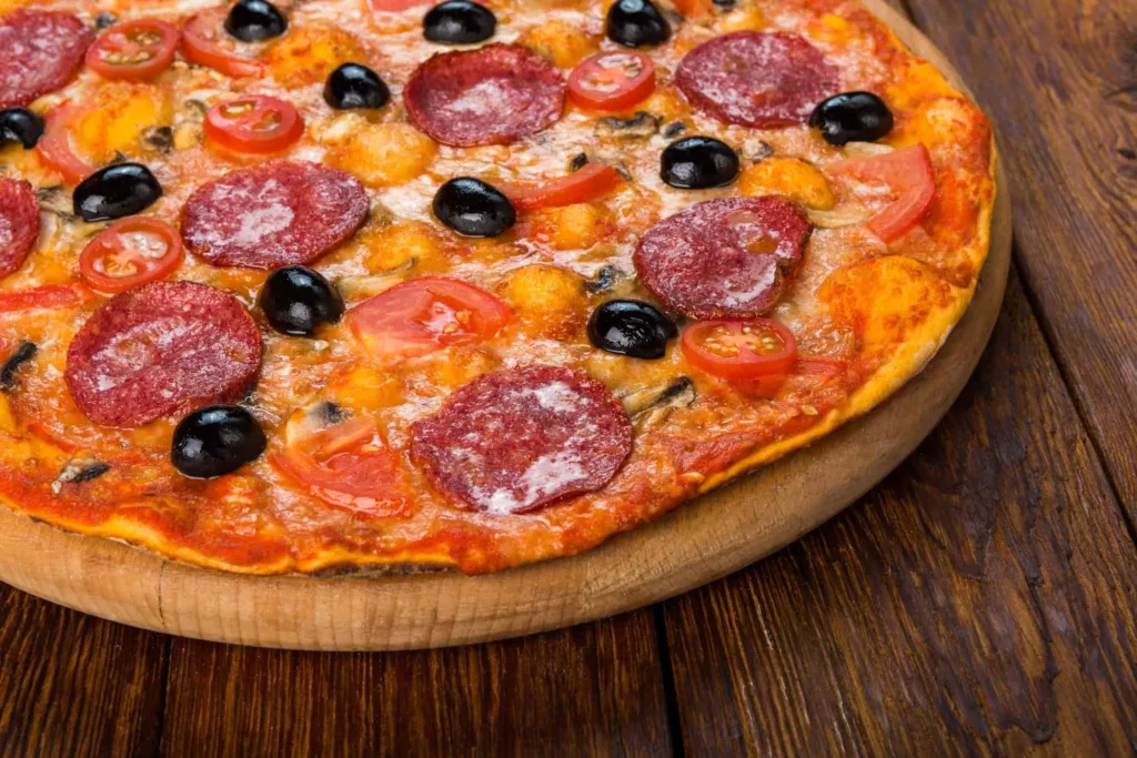 Pepperoni and Mushrooms Pizza from one of the restaurants with the best pizza in Oceanside