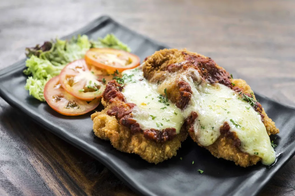 Chicken parmigiana with cheese and tomato sauce at Giovanni's Italian Restaurant