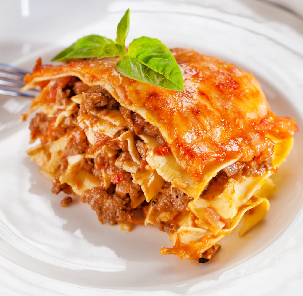 taco/lasagna fusion with lamb meat at Bros Comedor