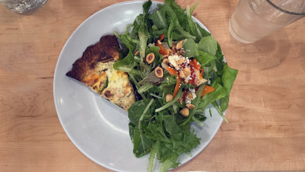 Asparagus, watercress, house ricotta and herbed quiche with a side salad at La Porte Rouge
